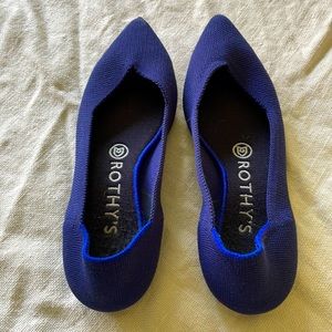 Blue Rothy’s flats.
